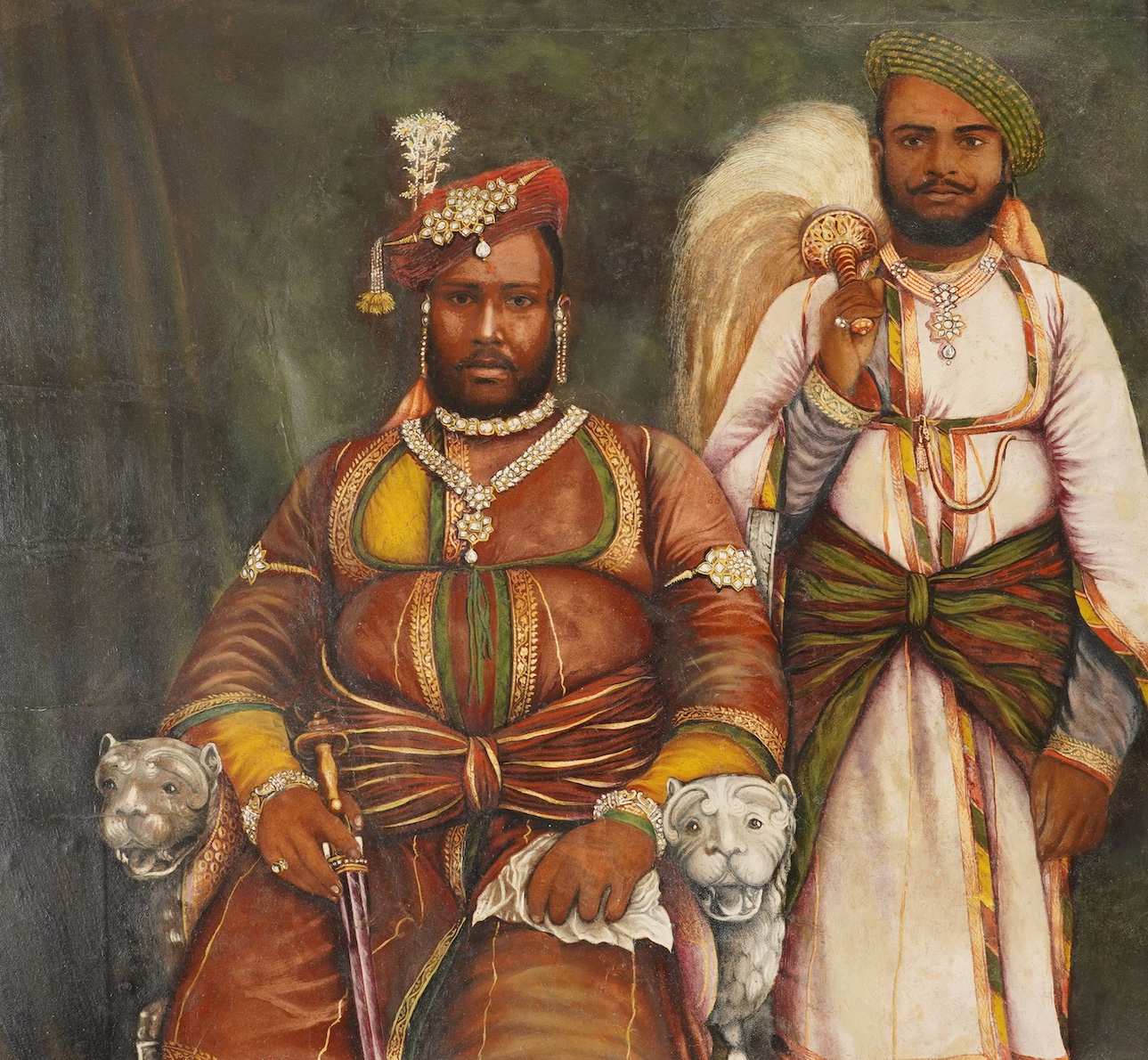 A hand painted albumen photograph of an Indian Maharajah with his attendant, late 19th century